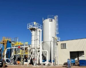 Biomass drying using large scale solid state microwave generators