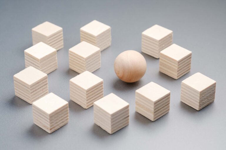 A sphere in the middle of several blocks, demonstrating uniqueness